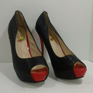 Black and red pumps